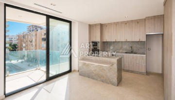 Квартира 1+1 в Махмутларе на первой береговой линии, 55 м² - Ракурс 3