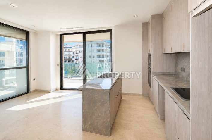 Квартира 1+1 в Махмутларе на первой береговой линии, 55 м² - Ракурс 3