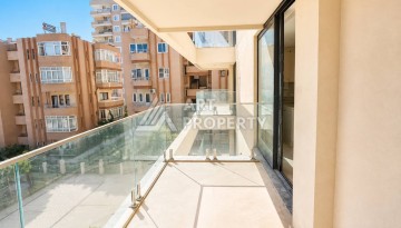 Квартира 1+1 в Махмутларе на первой береговой линии, 55 м² - Ракурс 6