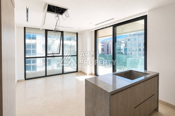 Квартира 1+1 в Махмутларе на первой береговой линии, 55 м² - Ракурс 6