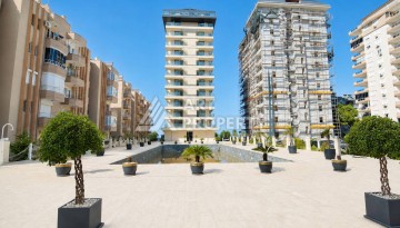 Квартира 1+1 в Махмутларе на первой береговой линии, 55 м² - Ракурс 10