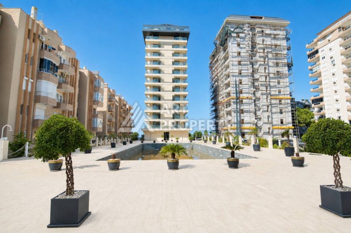 Квартира 1+1 в Махмутларе на первой береговой линии, 55 м² - Ракурс 9