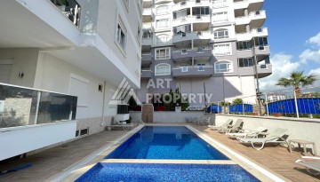 Квартира 1+1 в Оба рядом с морем, 55 м² - Ракурс 2