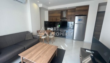 Квартира 1+1 с видом на море и бассейн, 55 м². Махмутлар, Алания - Ракурс 2