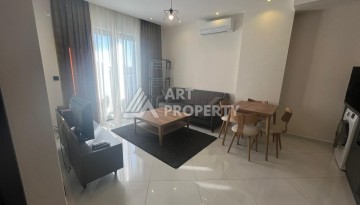 Квартира 1+1 с видом на море и бассейн, 55 м². Махмутлар, Алания - Ракурс 3