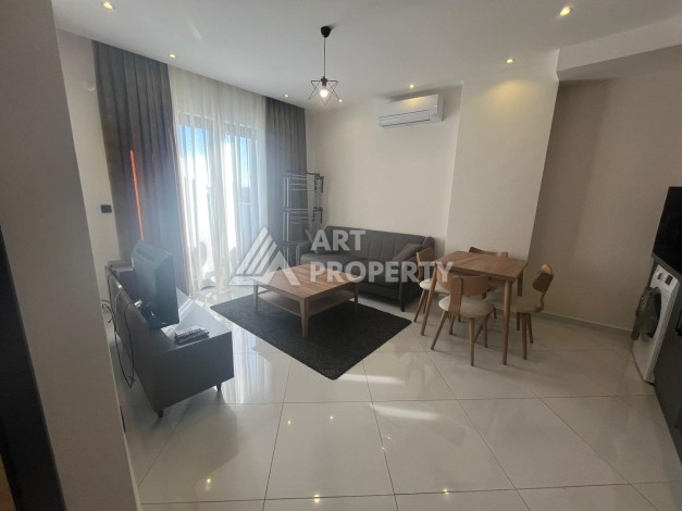 Квартира 1+1 с видом на море и бассейн, 55 м². Махмутлар, Алания - Ракурс 2