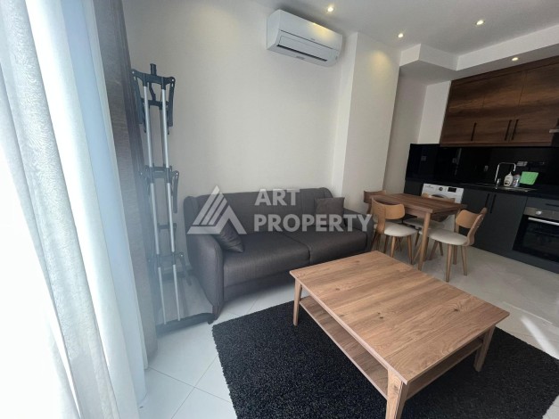 Квартира 1+1 с видом на море и бассейн, 55 м². Махмутлар, Алания - Ракурс 3