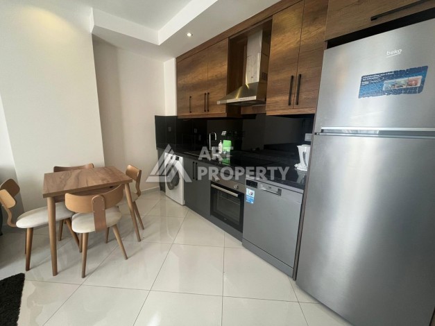 Квартира 1+1 с видом на море и бассейн, 55 м². Махмутлар, Алания - Ракурс 4