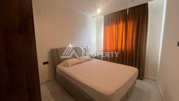 Квартира 1+1 с видом на море и бассейн, 55 м². Махмутлар, Алания - Ракурс 8