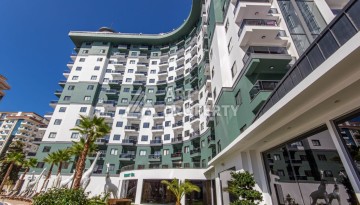 Квартира 1+1 с видом на море и бассейн, 55 м². Махмутлар, Алания - Ракурс 26
