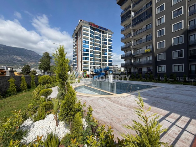 Дуплекс 2+1 в центре Махмутлара, 110 м² - Ракурс 0