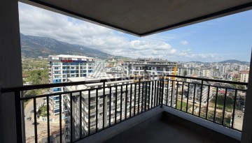 Дуплекс 2+1 в центре Махмутлара, 110 м² - Ракурс 2