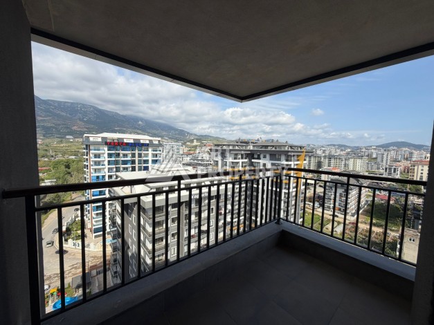 Дуплекс 2+1 в центре Махмутлара, 110 м² - Ракурс 1