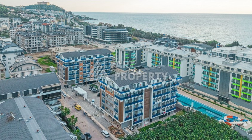Квартира 1+1 в современном ЖК у моря, 55 м². Каргыджак, Алания - Ракурс 0