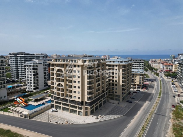 Квартира 1+1 в центре Махмутлара, 55 м² в новом ЖК - Ракурс 0