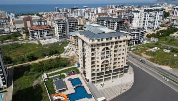 Квартира 1+1 в центре Махмутлара, 55 м² в новом ЖК - Ракурс 2