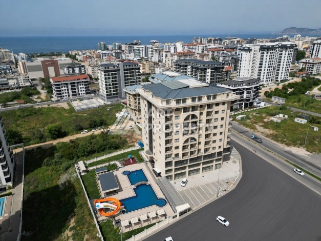 Квартира 1+1 в центре Махмутлара, 55 м² в новом ЖК - Ракурс 1