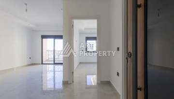 Квартира 1+1 в центре Махмутлара, 55 м² в новом ЖК - Ракурс 3