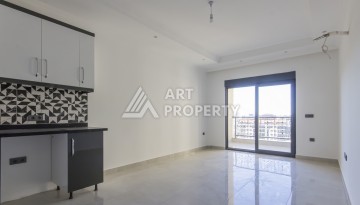 Квартира 1+1 в центре Махмутлара, 55 м² в новом ЖК - Ракурс 6