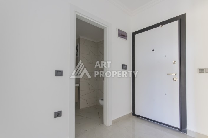 Квартира 1+1 в центре Махмутлара, 55 м² в новом ЖК - Ракурс 8