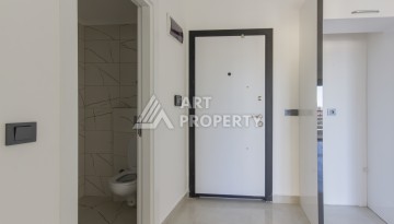 Квартира 1+1 в центре Махмутлара, 55 м² в новом ЖК - Ракурс 10