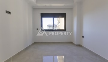 Квартира 1+1 в центре Махмутлара, 55 м² в новом ЖК - Ракурс 12