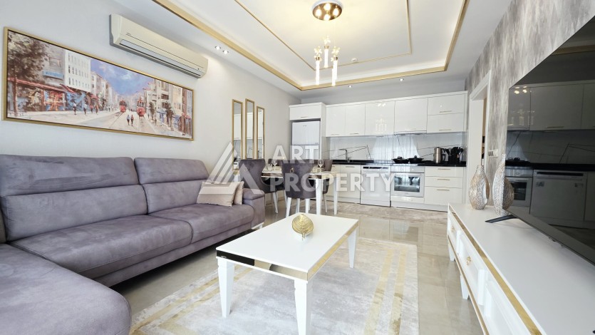 Квартира 2+1 в центре Махмутлара с видом на море - 100 м² - Ракурс 1