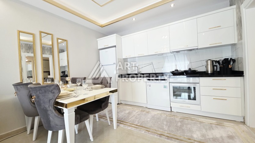 Квартира 2+1 в центре Махмутлара с видом на море - 100 м² - Ракурс 8