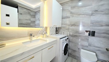 Квартира 2+1 в центре Махмутлара с видом на море - 100 м² - Ракурс 17