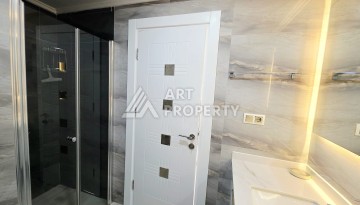 Квартира 2+1 в центре Махмутлара с видом на море - 100 м² - Ракурс 19