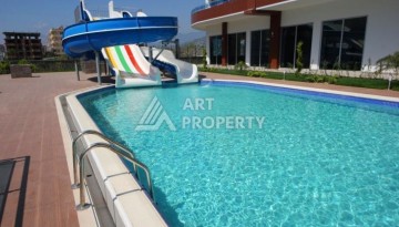 Квартира 2+1 в центре Махмутлара с видом на море - 100 м² - Ракурс 35