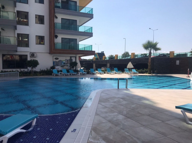 Трехкомнатная квартира на первой линии с панорамным видом на море в Махмутларе, 90м2 - Ракурс 3