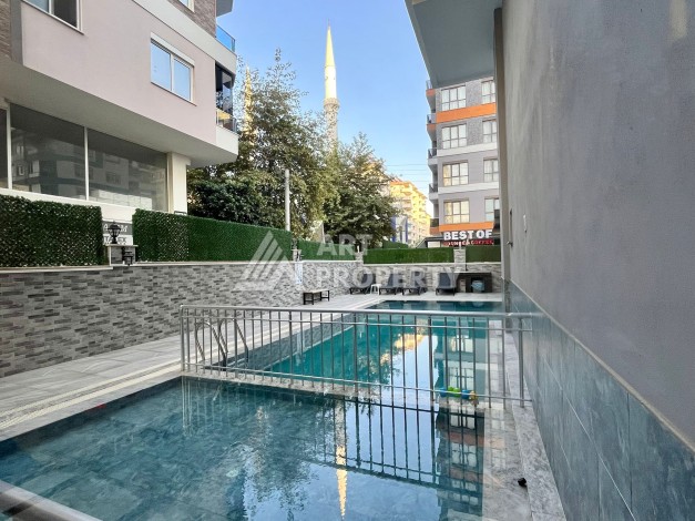 Квартира 1+1 в Махмутларе, 60 м², рядом с морем - Ракурс 1
