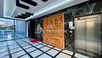 Квартира 1+1 в Махмутларе, 60 м², рядом с морем - Ракурс 3