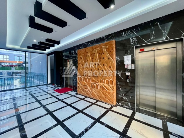 Квартира 1+1 в Махмутларе, 60 м², рядом с морем - Ракурс 2