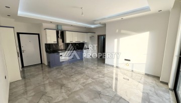 Квартира 1+1 в Махмутларе, 60 м², рядом с морем - Ракурс 5