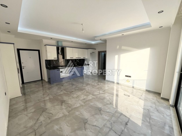 Квартира 1+1 в Махмутларе, 60 м², рядом с морем - Ракурс 4