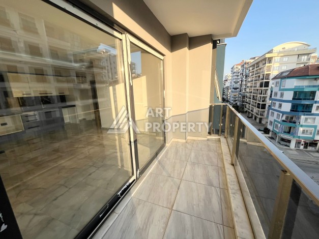 Квартира 1+1 в Махмутларе, 60 м², рядом с морем - Ракурс 5
