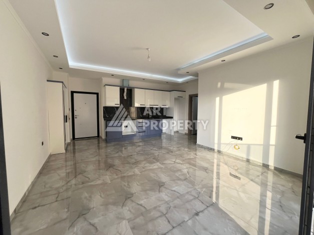 Квартира 1+1 в Махмутларе, 60 м², рядом с морем - Ракурс 6