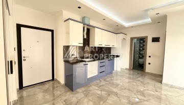Квартира 1+1 в Махмутларе, 60 м², рядом с морем - Ракурс 8