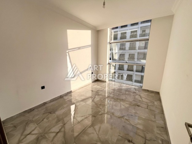 Квартира 1+1 в Махмутларе, 60 м², рядом с морем - Ракурс 10