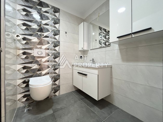 Квартира 1+1 в Махмутларе, 60 м², рядом с морем - Ракурс 12