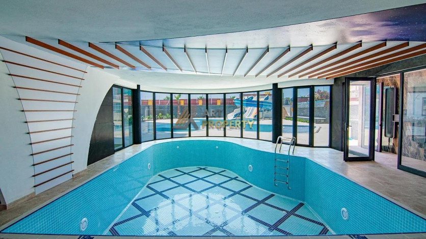 Трехкомнатная квартира на первой линии с панорамным видом на море в Махмутларе, 90м2 - Ракурс 13