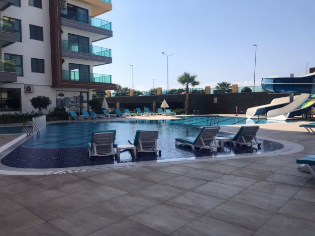 Трехкомнатная квартира на первой линии с панорамным видом на море в Махмутларе, 90м2 - Ракурс 14