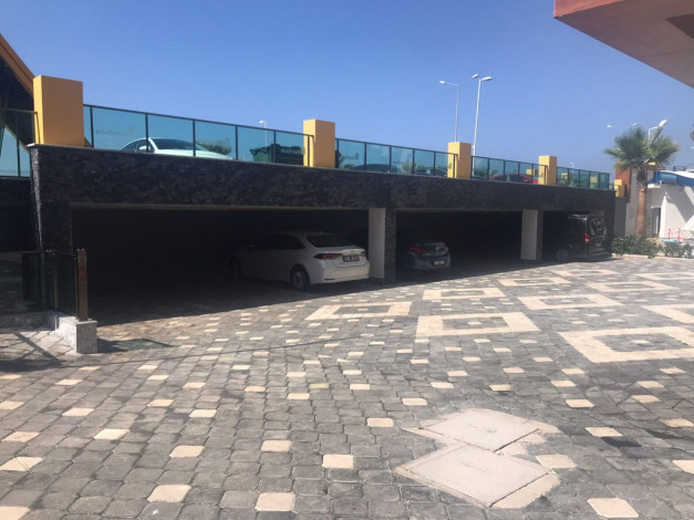 Трехкомнатная квартира на первой линии с панорамным видом на море в Махмутларе, 90м2 - Ракурс 19