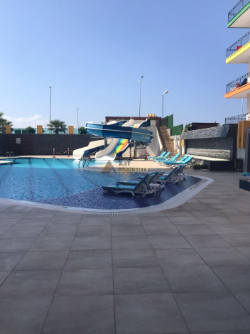 Трехкомнатная квартира на первой линии с панорамным видом на море в Махмутларе, 90м2 - Ракурс 20