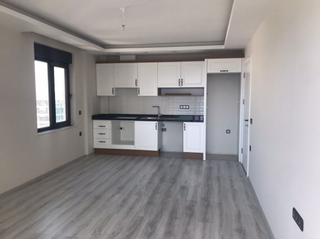 Трехкомнатная квартира на первой линии с панорамным видом на море в Махмутларе, 90м2 - Ракурс 25