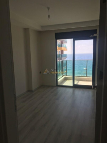 Трехкомнатная квартира на первой линии с панорамным видом на море в Махмутларе, 90м2 - Ракурс 26