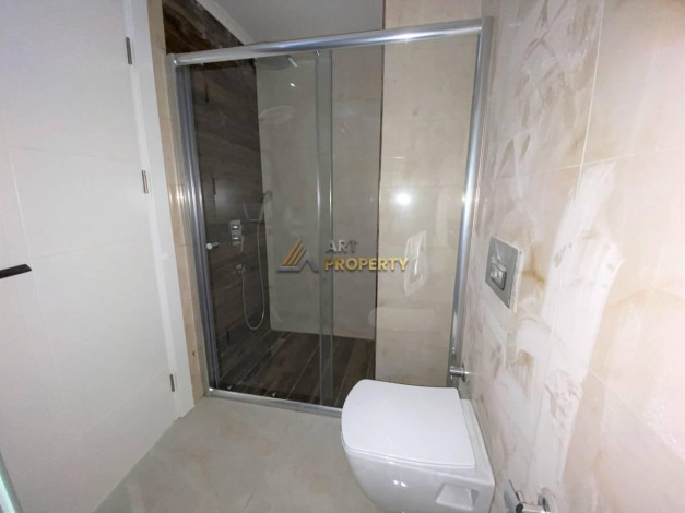 Трехкомнатная квартира на первой линии с панорамным видом на море в Махмутларе, 90м2 - Ракурс 28