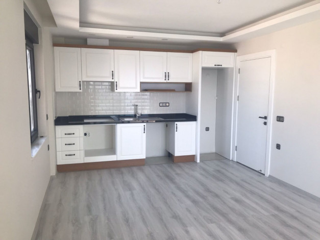 Трехкомнатная квартира на первой линии с панорамным видом на море в Махмутларе, 90м2 - Ракурс 31